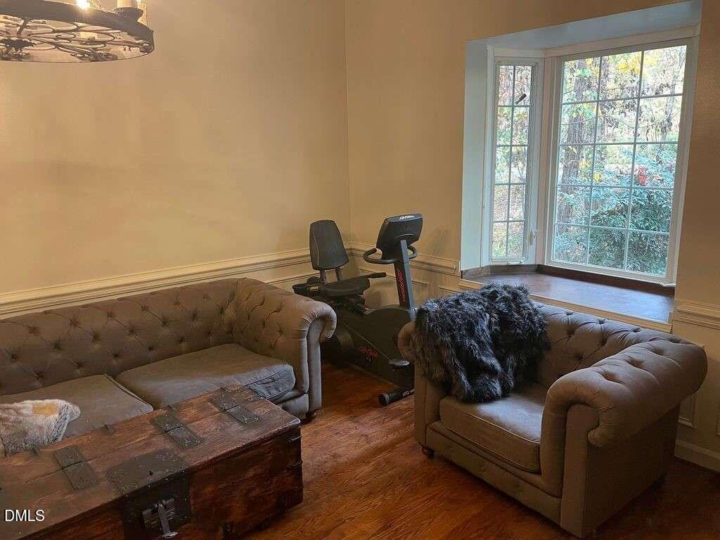 1204 Queensferry Road Cary, NC 27511 - Photo 9 of 50 a living room with furniture and a window
