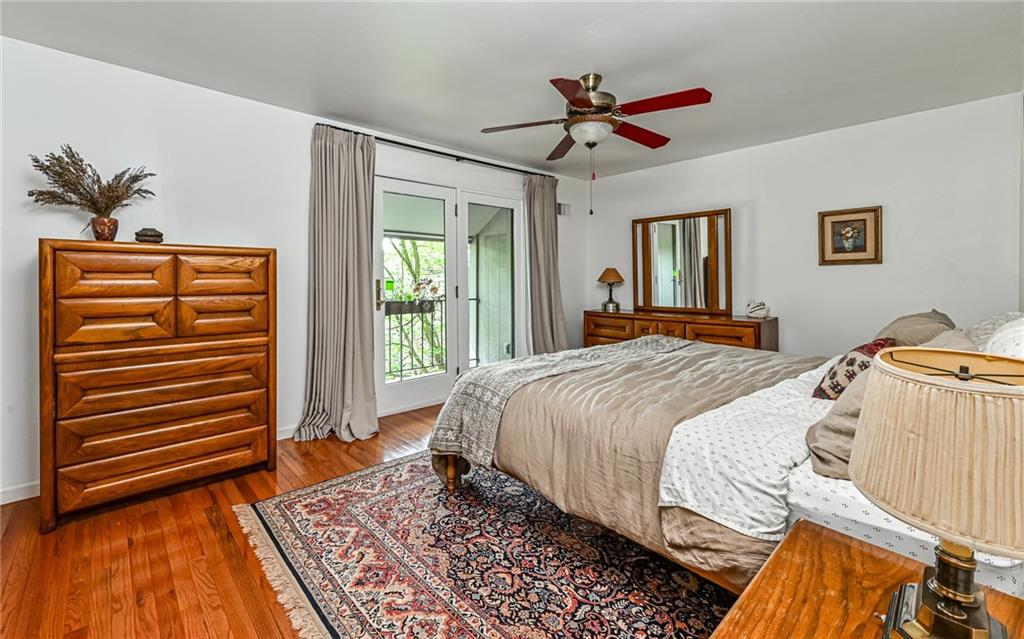 109 Colwyn Road Pittsburgh, PA 15237 - Photo 21 of 40 Primary bedroom with hardwood floors has it's own balcony for some fresh air!