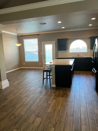 a view of livingroom with furniture and wooden floor
