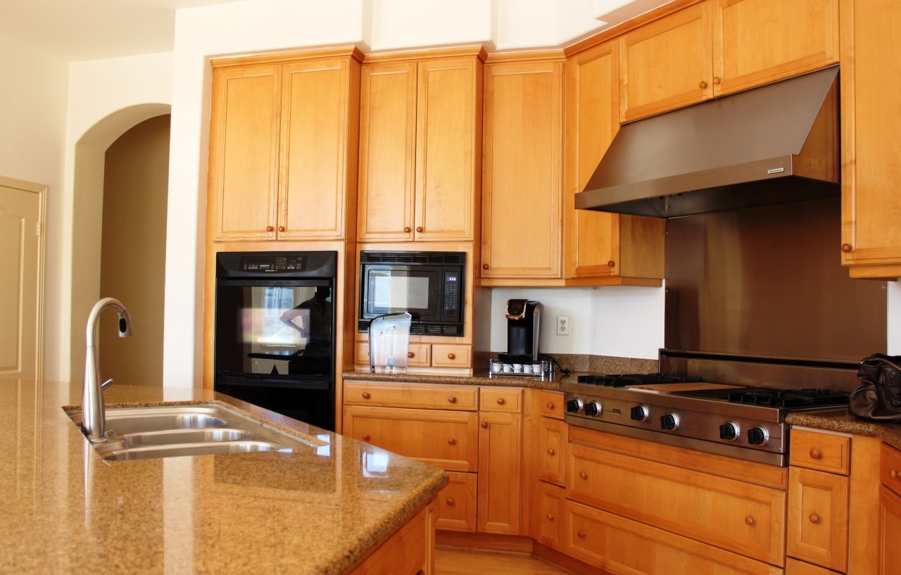13635 Overland Pass Road Poway, CA 92064 - Photo 13 of 25 Built-in ovens, microwave and cooktop.