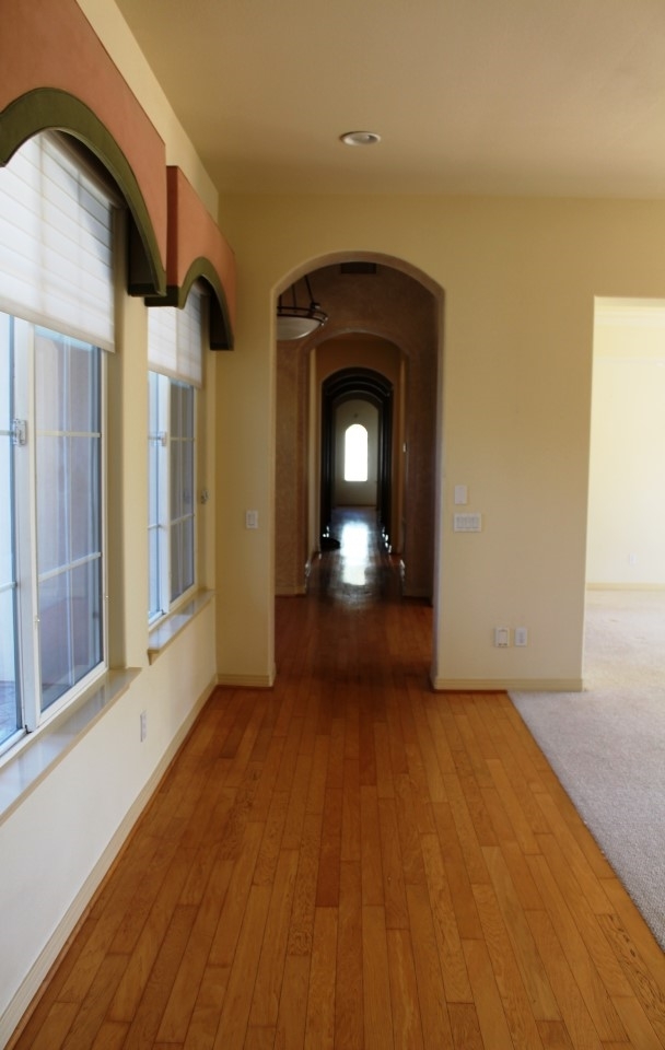 13635 Overland Pass Road Poway, CA 92064 - Photo 17 of 25 Multiple arched hallway.