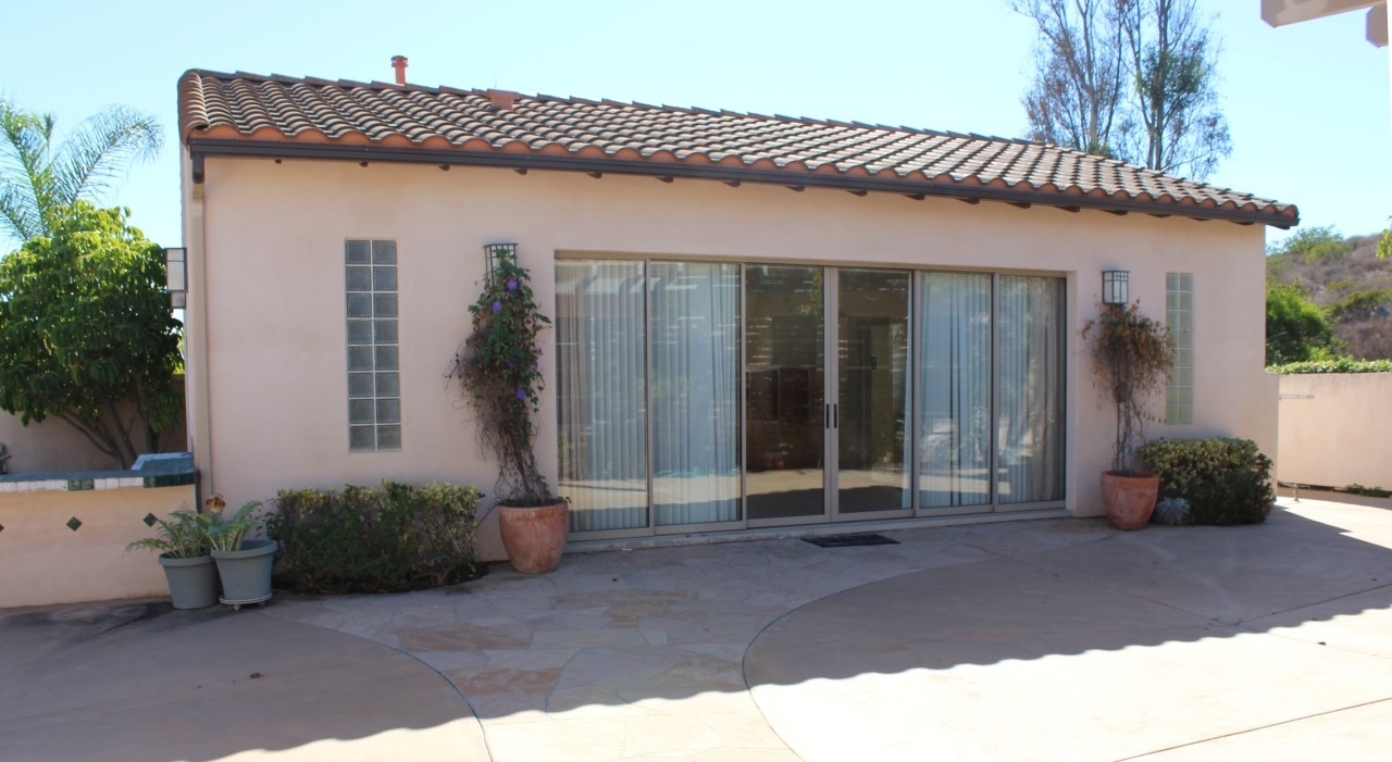 13635 Overland Pass Road Poway, CA 92064 - Photo 23 of 25 Spacious guest house/workshop with kitchen, bath, and a workshop. Includes a floor safe, 220V, pull down ladder to storage above.