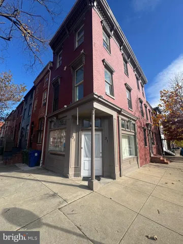 a view of a building with a street