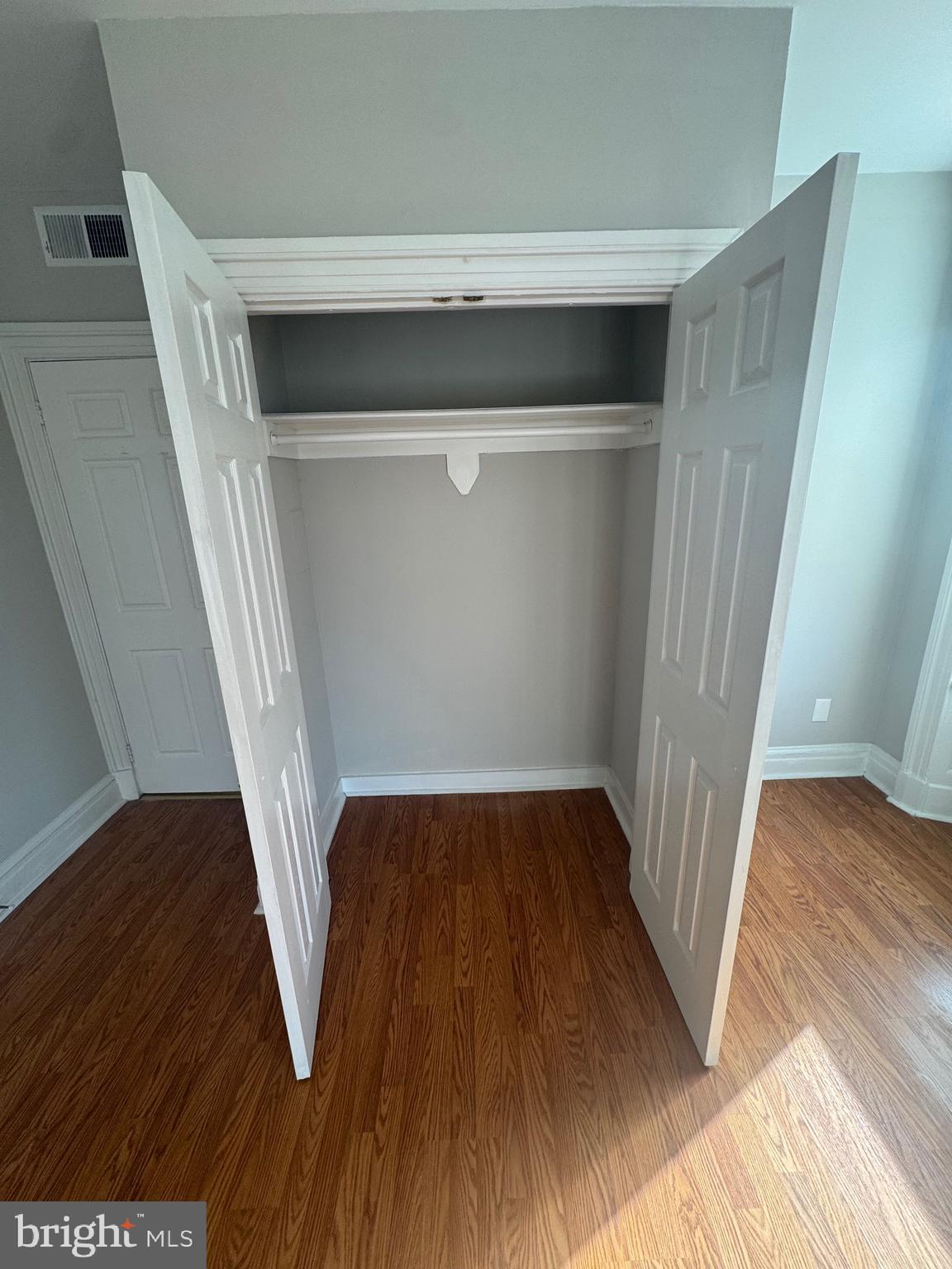 31 South Arlington Avenue Baltimore, MD 21223 - Photo 2 of 10 a view of wooden floor in a room