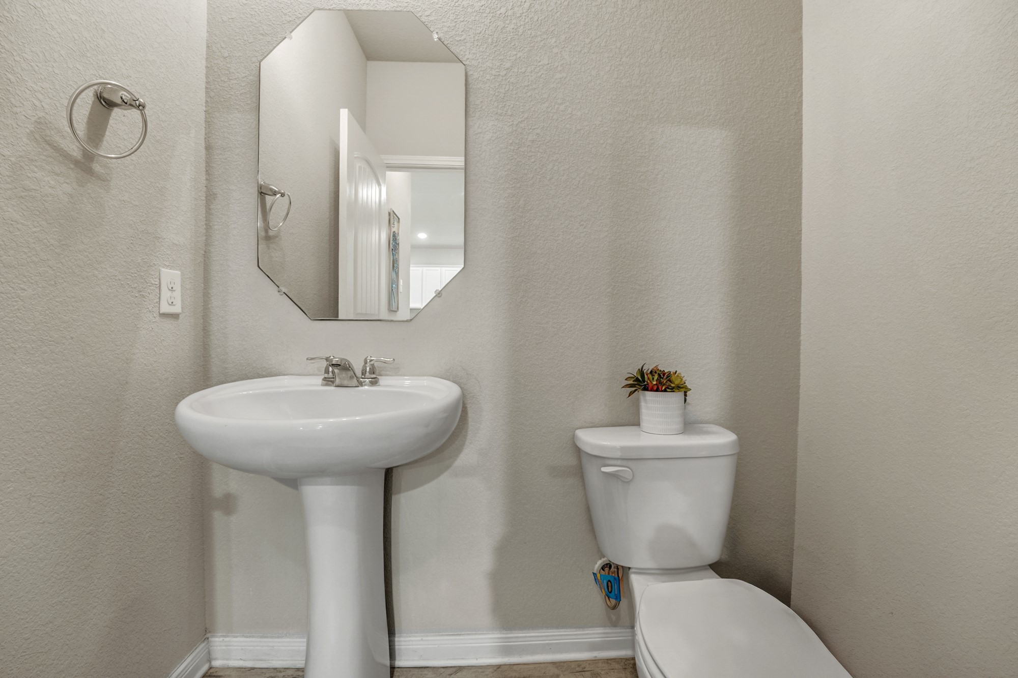 633 Donegal Lane Georgetown, TX 78626 - Photo 15 of 21 a bathroom with a toilet sink and mirror