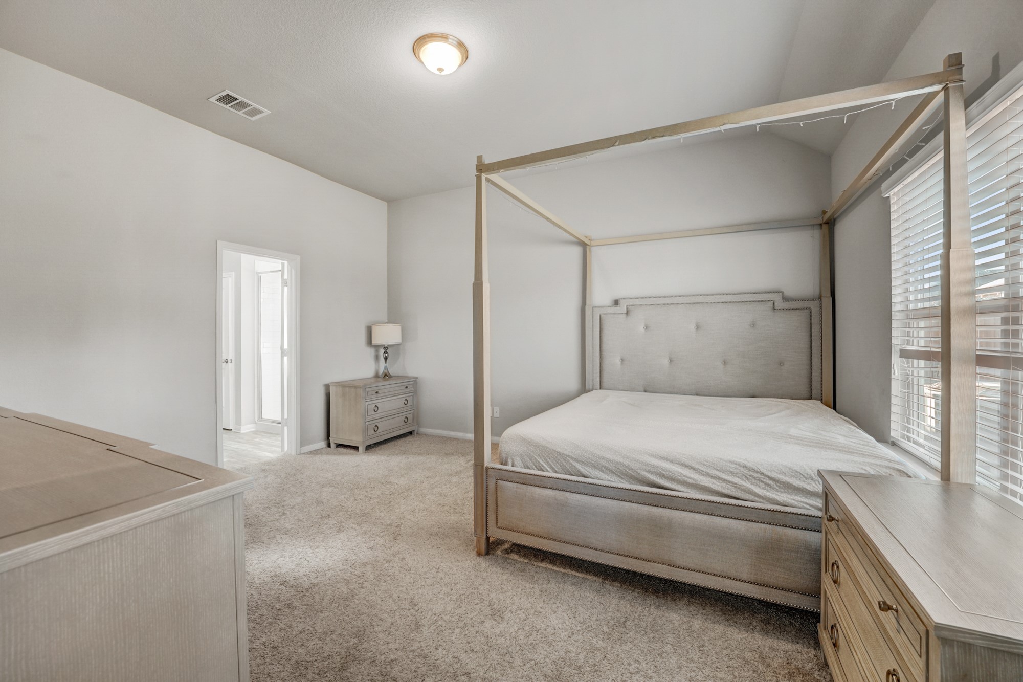 633 Donegal Lane Georgetown, TX 78626 - Photo 16 of 21 a bedroom with a bed and a cabinets