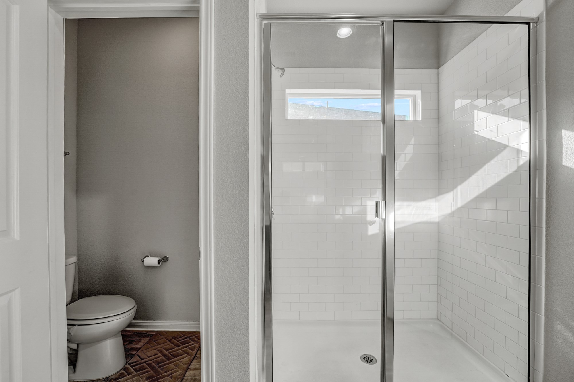 633 Donegal Lane Georgetown, TX 78626 - Photo 19 of 21 a bathroom with a granite countertop toilet and a shower