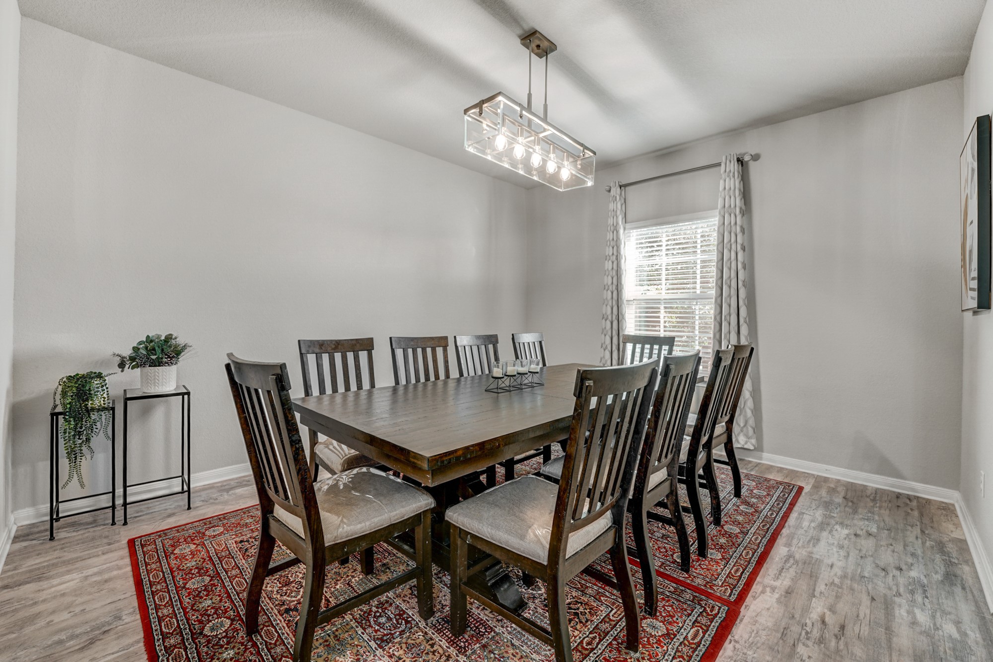 633 Donegal Lane Georgetown, TX 78626 - Photo 5 of 21 a view of a dining room with furniture and chandelier