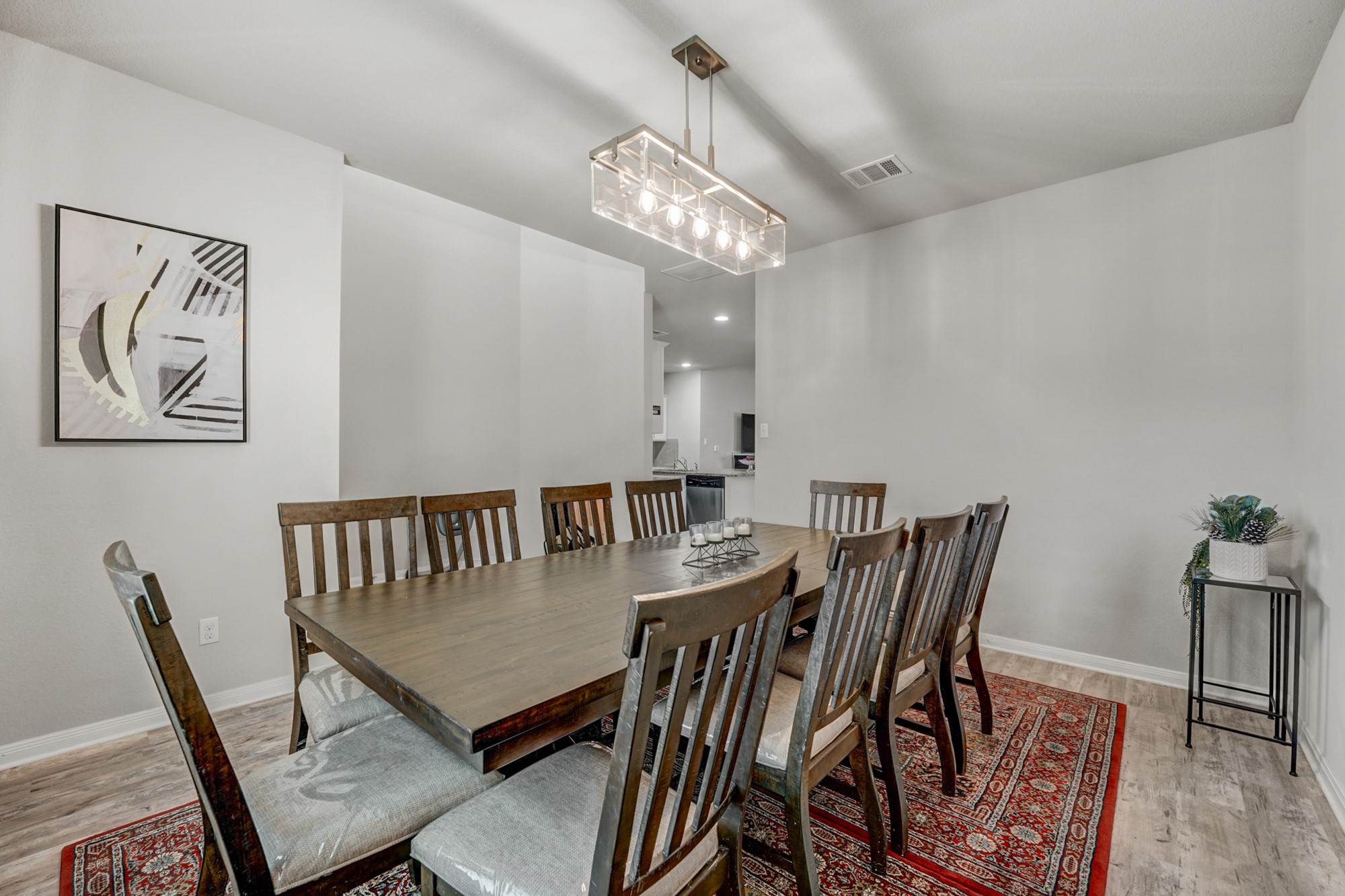 633 Donegal Lane Georgetown, TX 78626 - Photo 10 of 21 a view of a dining room with furniture and wooden floor