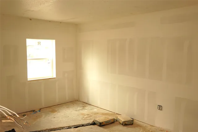 a view of a bathroom from a hallway