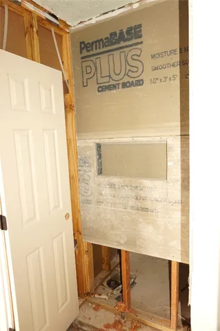 an empty room with a empty space and a window