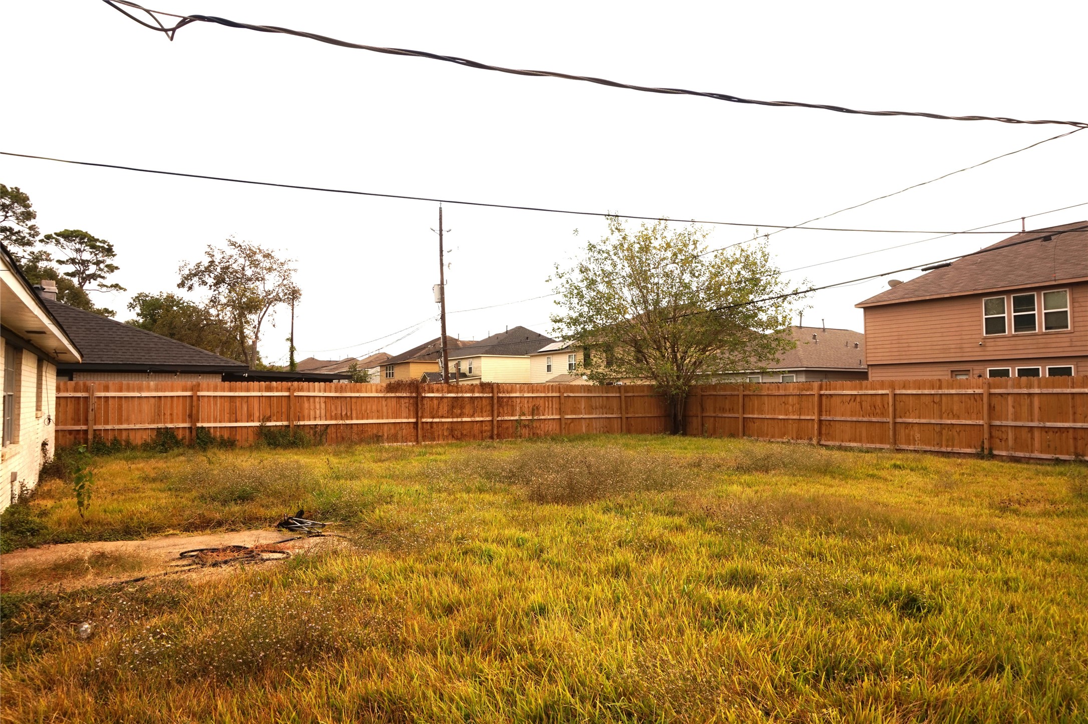 15902 Dunman Lane Houston, TX 77044 - Photo 27 of 28 a view of a yard with a large tree