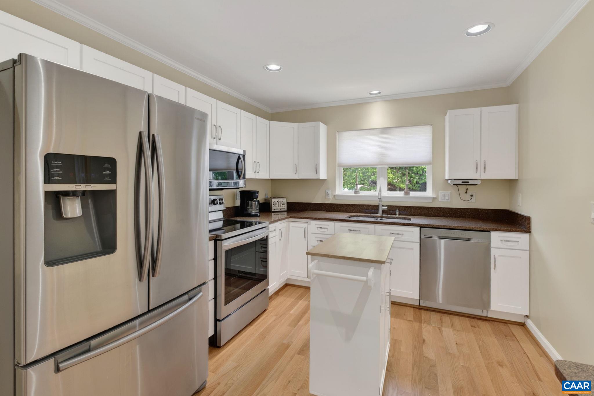 590 Mockingbird Way Charlottesville, VA 22901 - Photo 12 of 43 a kitchen with a refrigerator stove and microwave