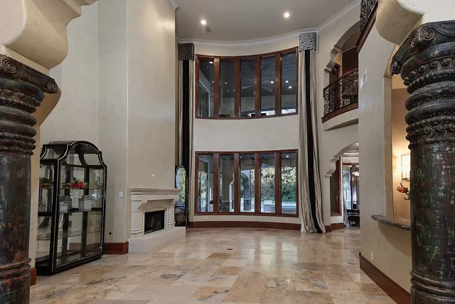 a view of an entryway with a fireplace