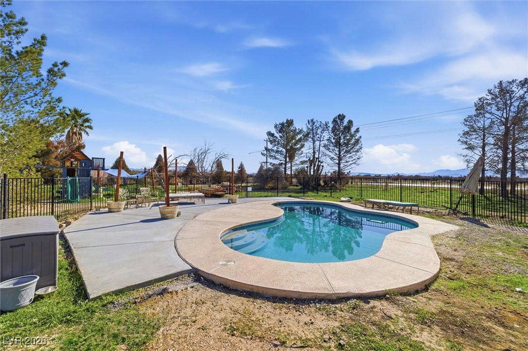 2570 East Kellogg Road Pahrump, NV 89048 - Photo 47 of 60 Fully-fenced pool