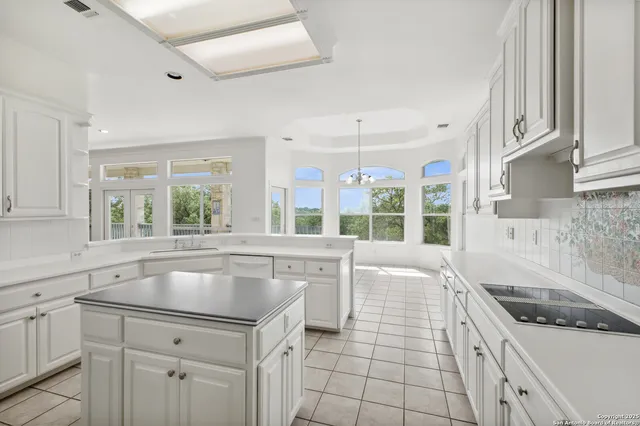 a view of entryway with kitchen