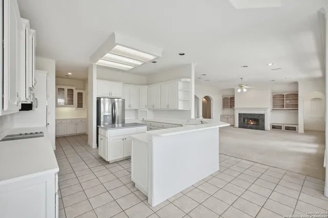 a view of a balcony with wooden floor