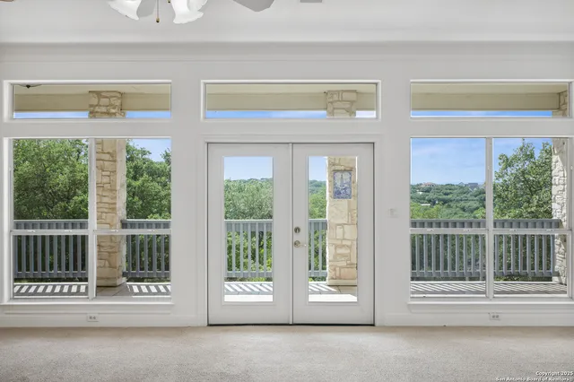 a white bath tub with a shower