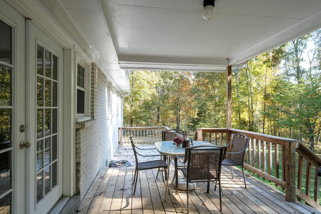 6615 Slaughter Road Santa Fe, TN 38482 - Photo 25 of 30 a view of a chairs and table in the balcony