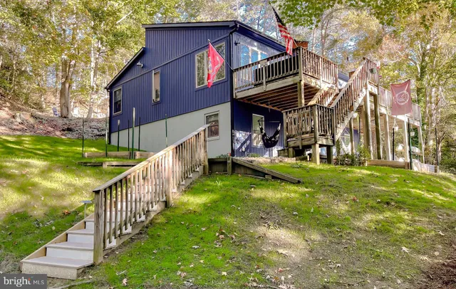 a view of a chairs on the side of the road