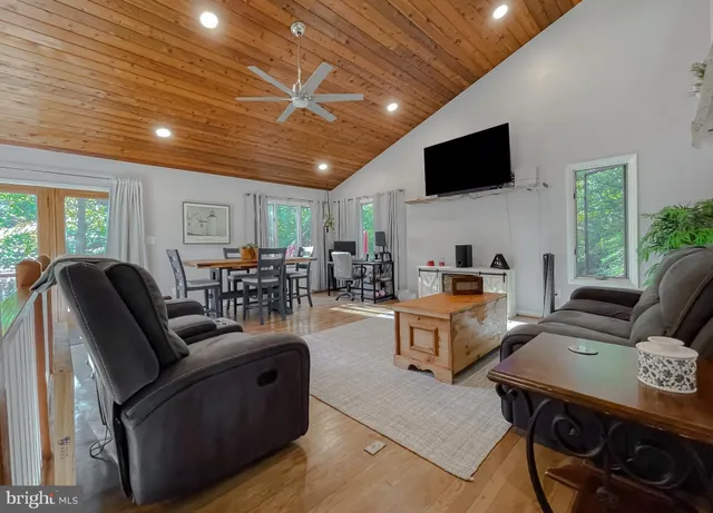 a bathroom with a sink vanity and mirror
