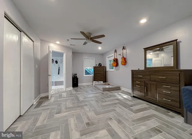 a view of walk in closet and bedroom view