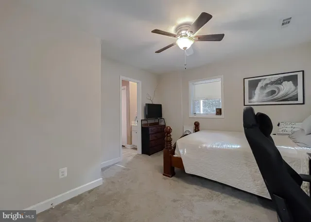 a view of a small space in the backyard of a house