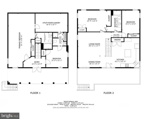 a view of a white house with large windows and a table and chairs in a patio