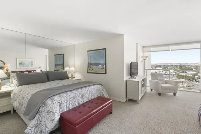 a bed room with a bed and a couch