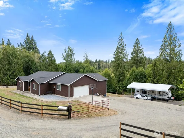 a house with trees in the background