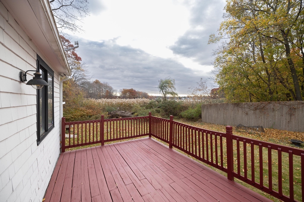 82 Holden Street Worcester, MA 01605 - Photo 2 of 19 a view of deck with wooden floor and fence