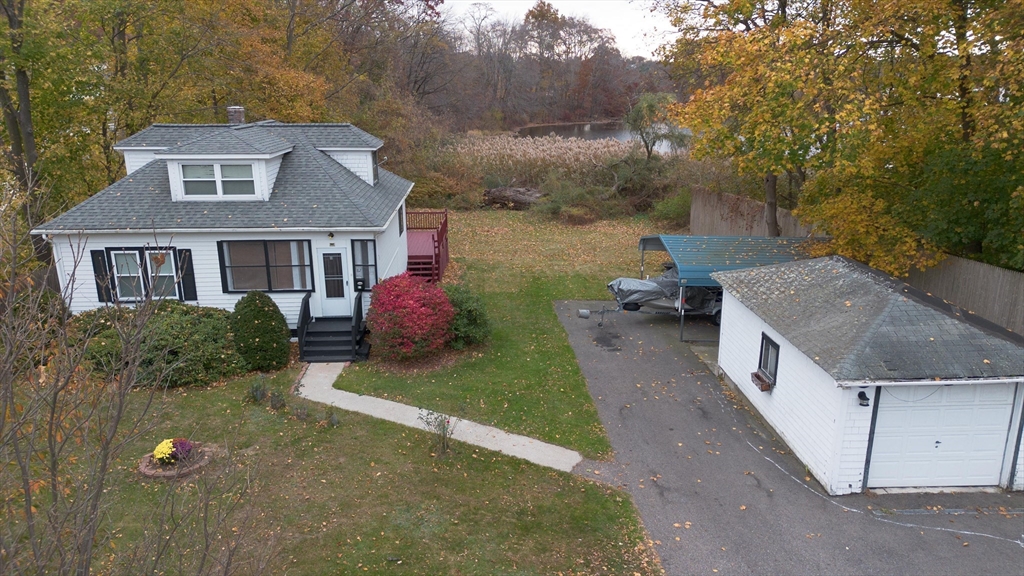 82 Holden Street Worcester, MA 01605 - Photo 3 of 19 a aerial view of a house with yard and garage