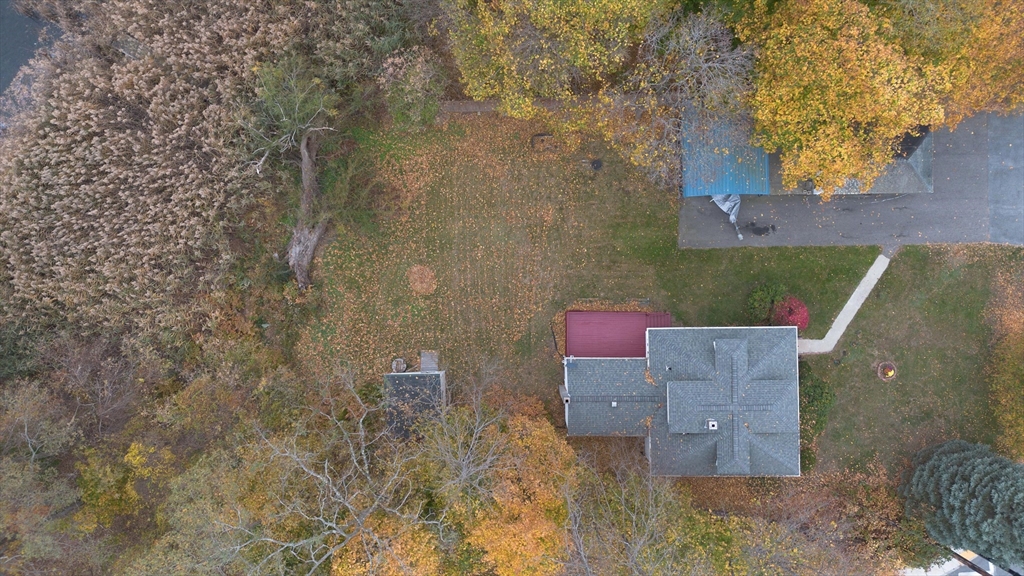 82 Holden Street Worcester, MA 01605 - Photo 5 of 19 a aerial view of a house with a yard