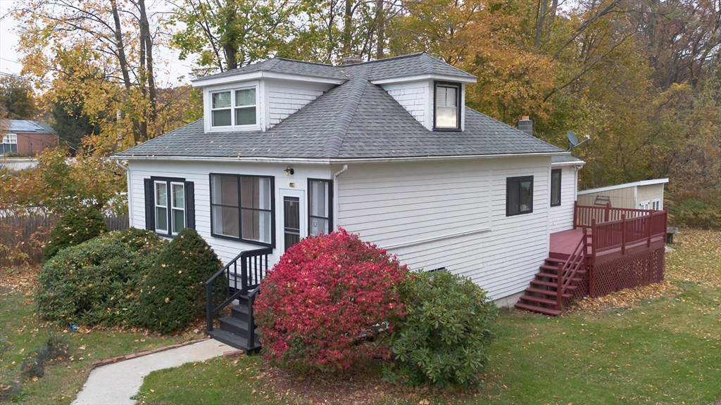 82 Holden Street Worcester, MA 01605 - Photo 8 of 19 a front view of a house with a yard