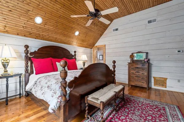 a view of a park with large trees