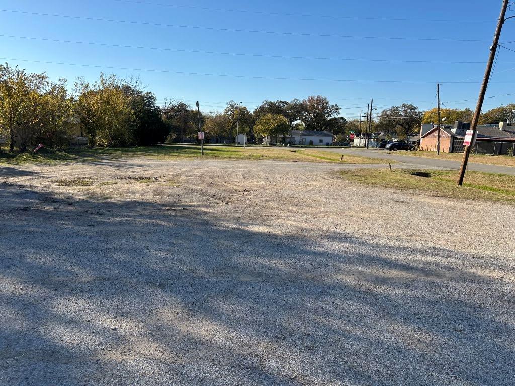1106 Murdock Road Dallas, TX 75217 - Photo 11 of 11 a view of a lake view with a yard