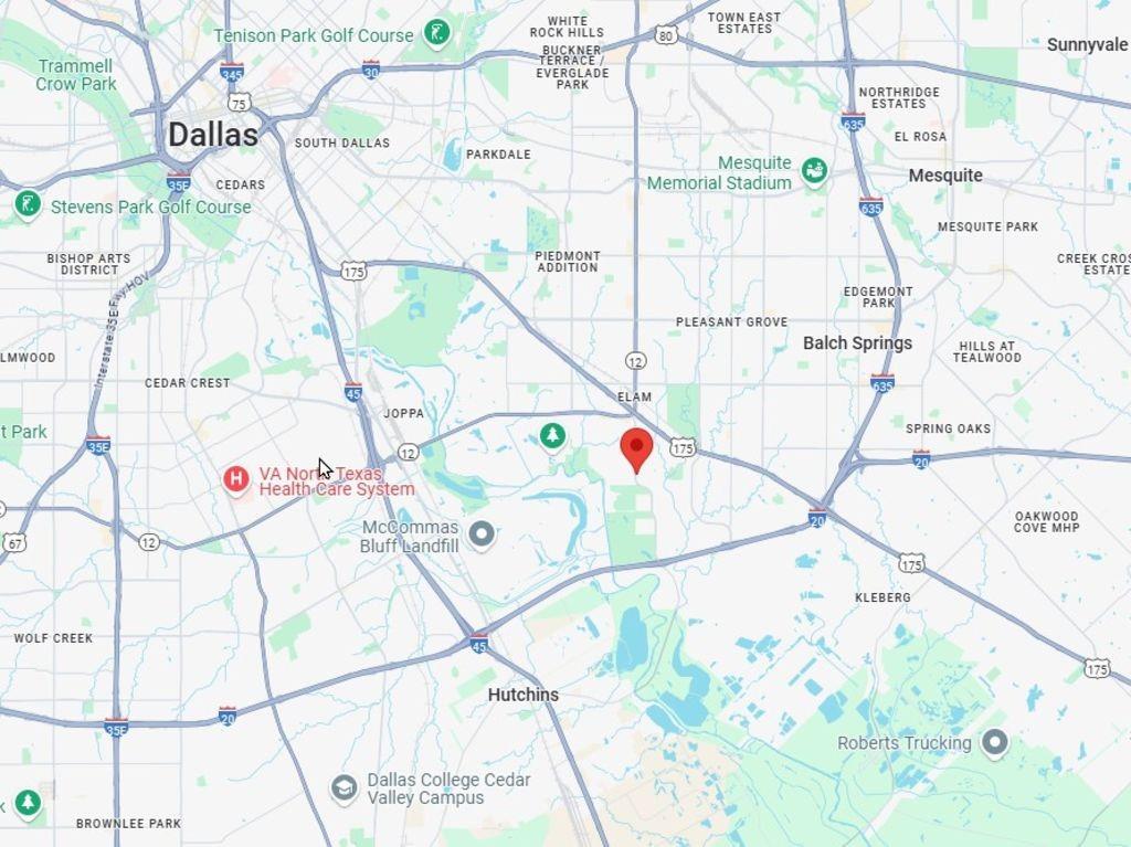 1106 Murdock Road Dallas, TX 75217 - Photo 7 of 11 a white bath tub sitting next to a white door