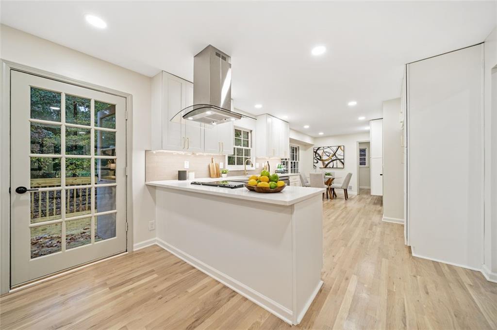 2089 Carthage Road Tucker, GA 30084 - Photo 11 of 38 a view of a kitchen with wooden floor and a sink