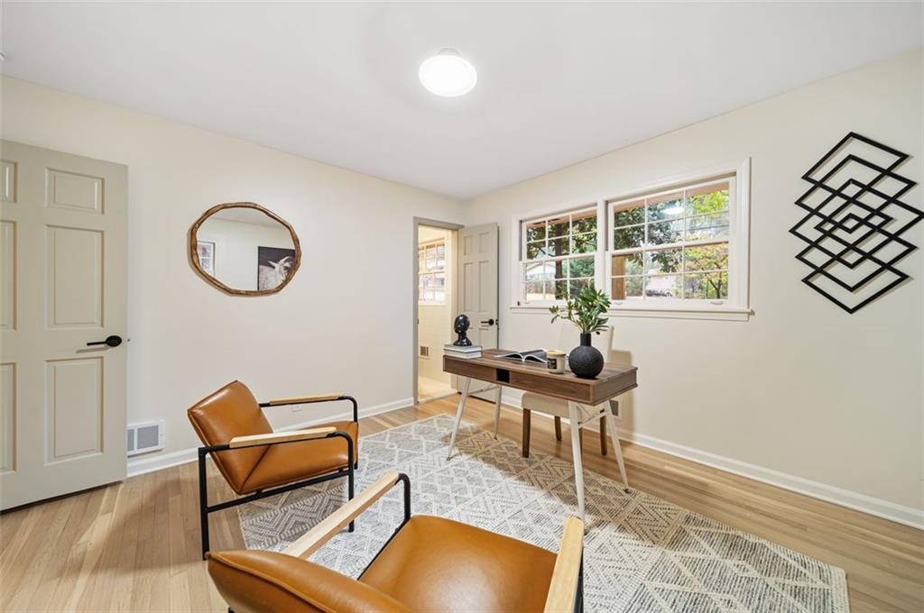 2089 Carthage Road Tucker, GA 30084 - Photo 22 of 38 a living room with furniture a window and a potted plant