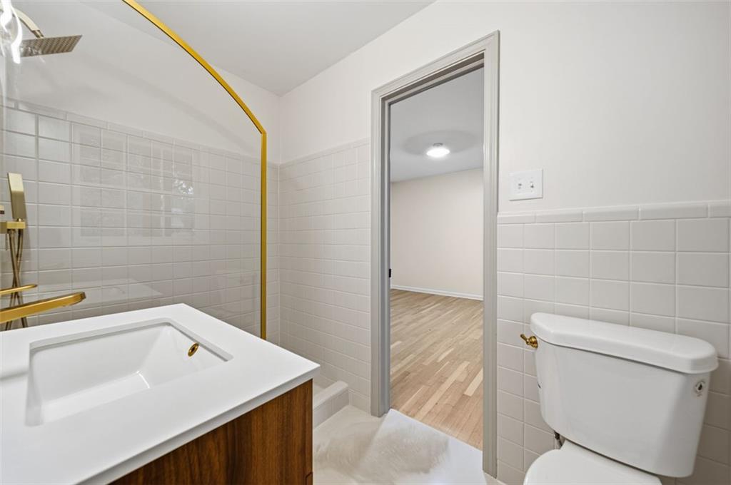 2089 Carthage Road Tucker, GA 30084 - Photo 23 of 38 a bathroom with a sink toilet and tub