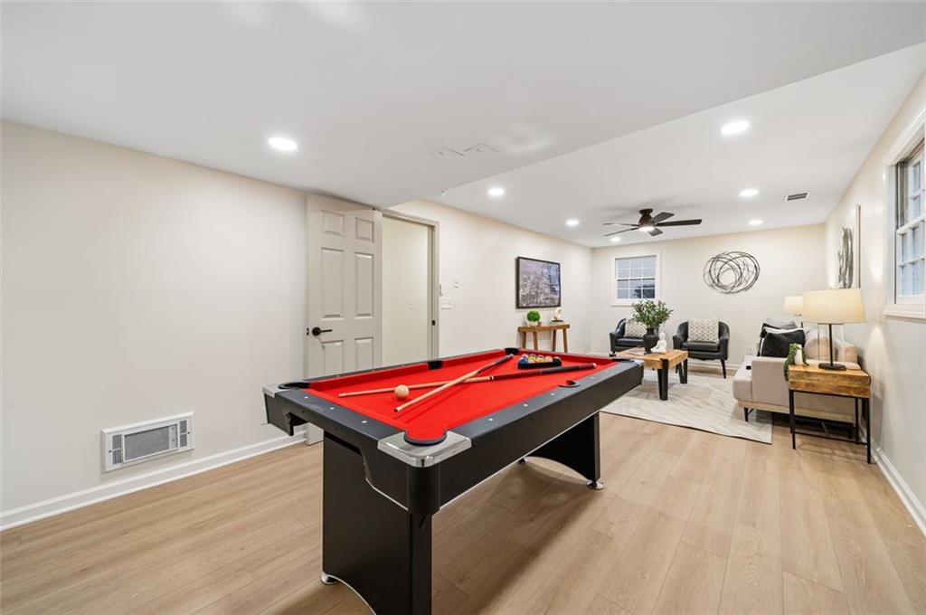 2089 Carthage Road Tucker, GA 30084 - Photo 25 of 38 a living room with a table tennis pool and couches