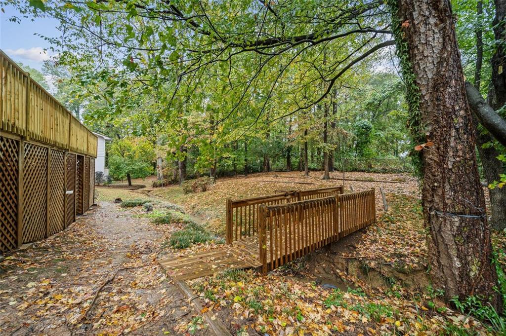 2089 Carthage Road Tucker, GA 30084 - Photo 35 of 38 a backyard of a house with lots of green space
