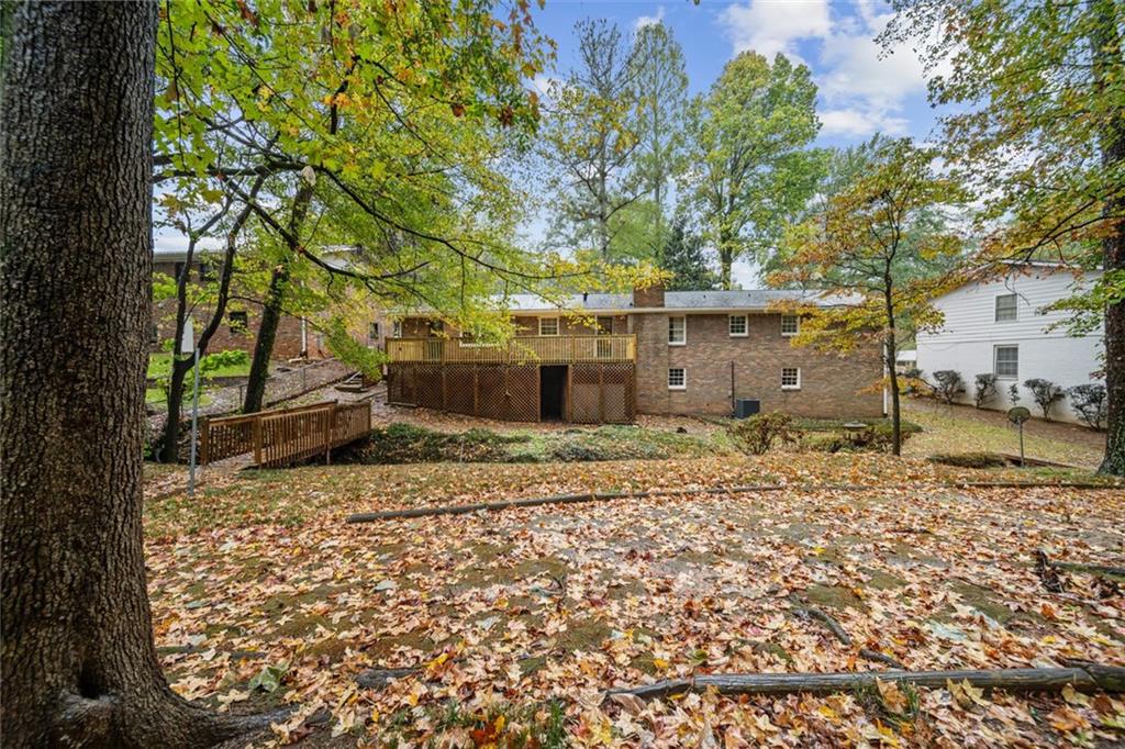 2089 Carthage Road Tucker, GA 30084 - Photo 36 of 38 a front view of a house with a yard