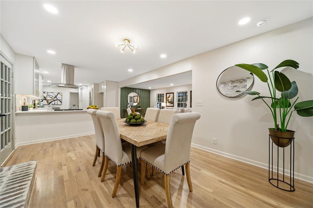2089 Carthage Road Tucker, GA 30084 - Photo 10 of 38 a view of a dining room with furniture and wooden floor