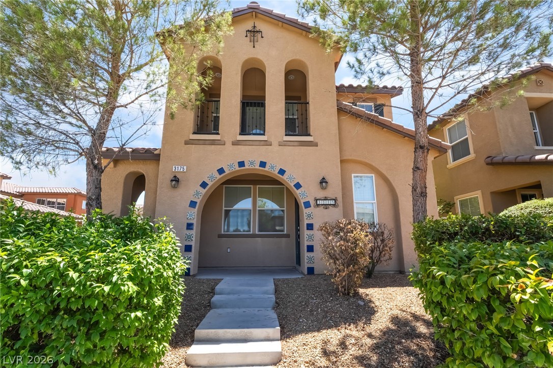 3175 Via Seranova Henderson, NV 89044 - Photo 1 of 45 This two-story residence features a charming stucco exterior and a welcoming entryway.