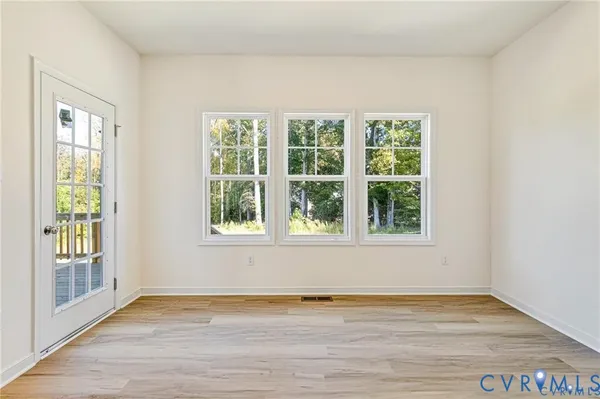 an empty room with windows
