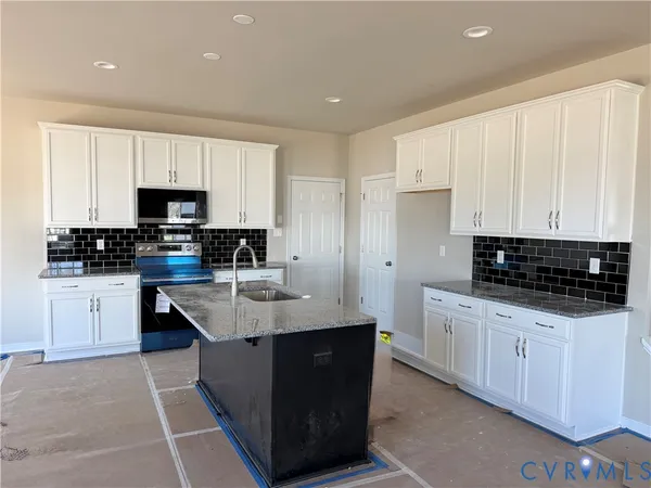 a view of a livingroom with wooden floor