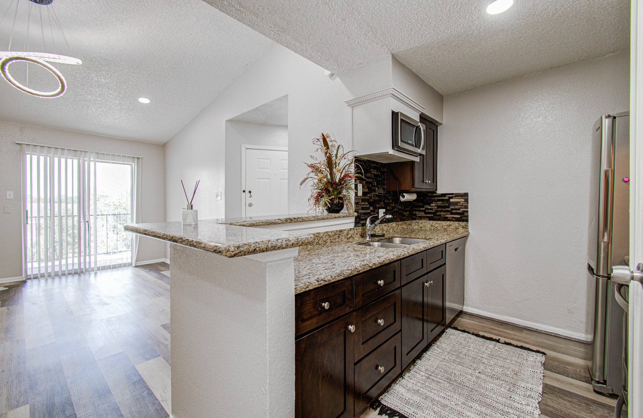 10101 South Gessner Road, Unit 405 Houston, TX 77071 - Photo 15 of 27 a bathroom with a double vanity sink and a mirror