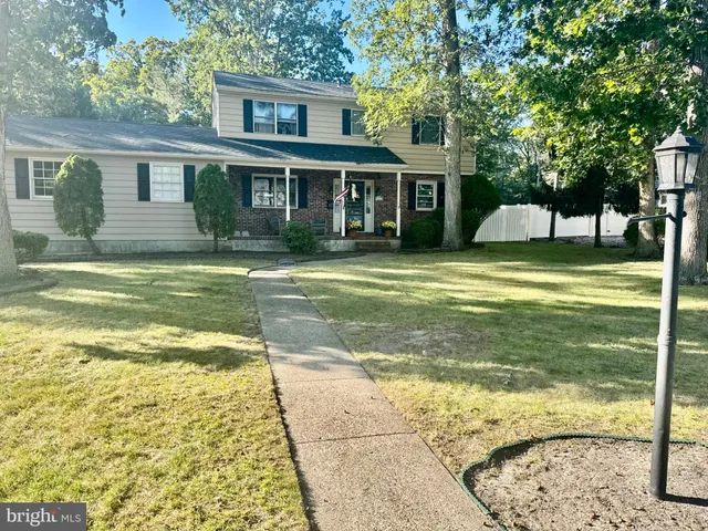 a view of a house with a swimming pool
