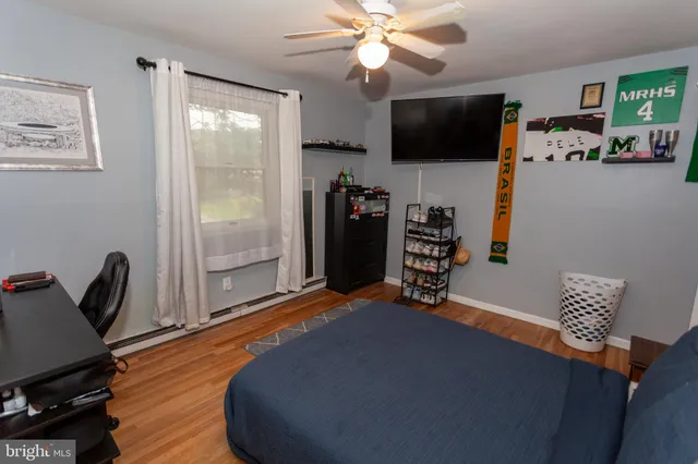 a room with furniture and a flat screen tv